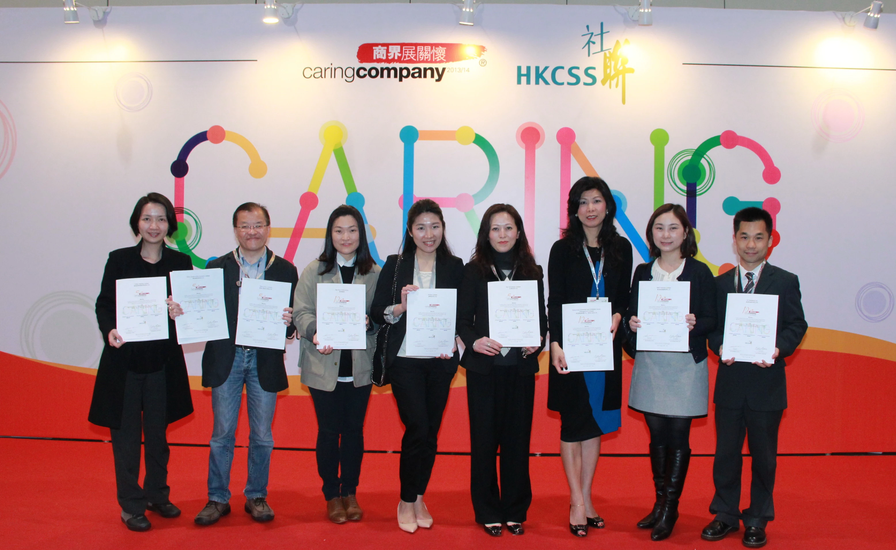 NWS Holdings and member companies garner 10 Years Plus Caring Company logo